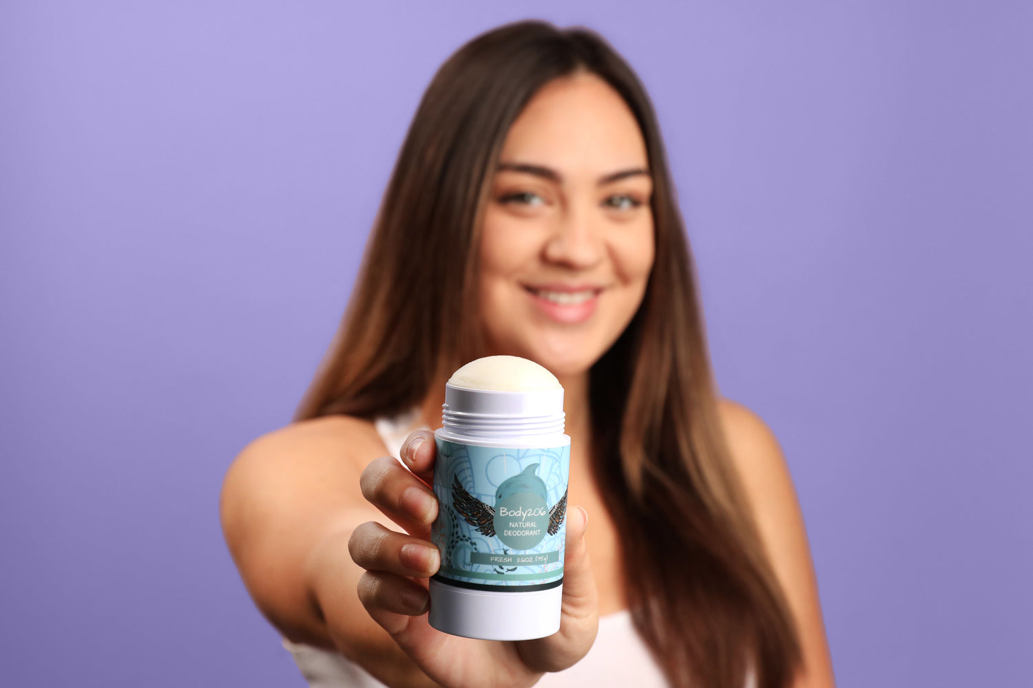 girl holding lavender scented deodorant stick